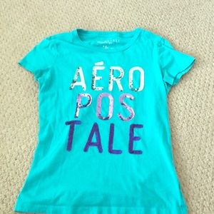 A blue short sleeve shirt